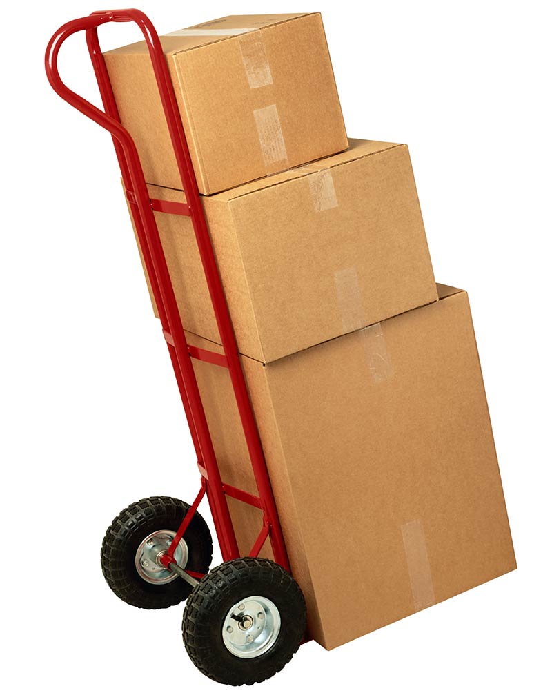 A hand truck totes three cardboard boxes to the premiere Villa Rica storage facility.